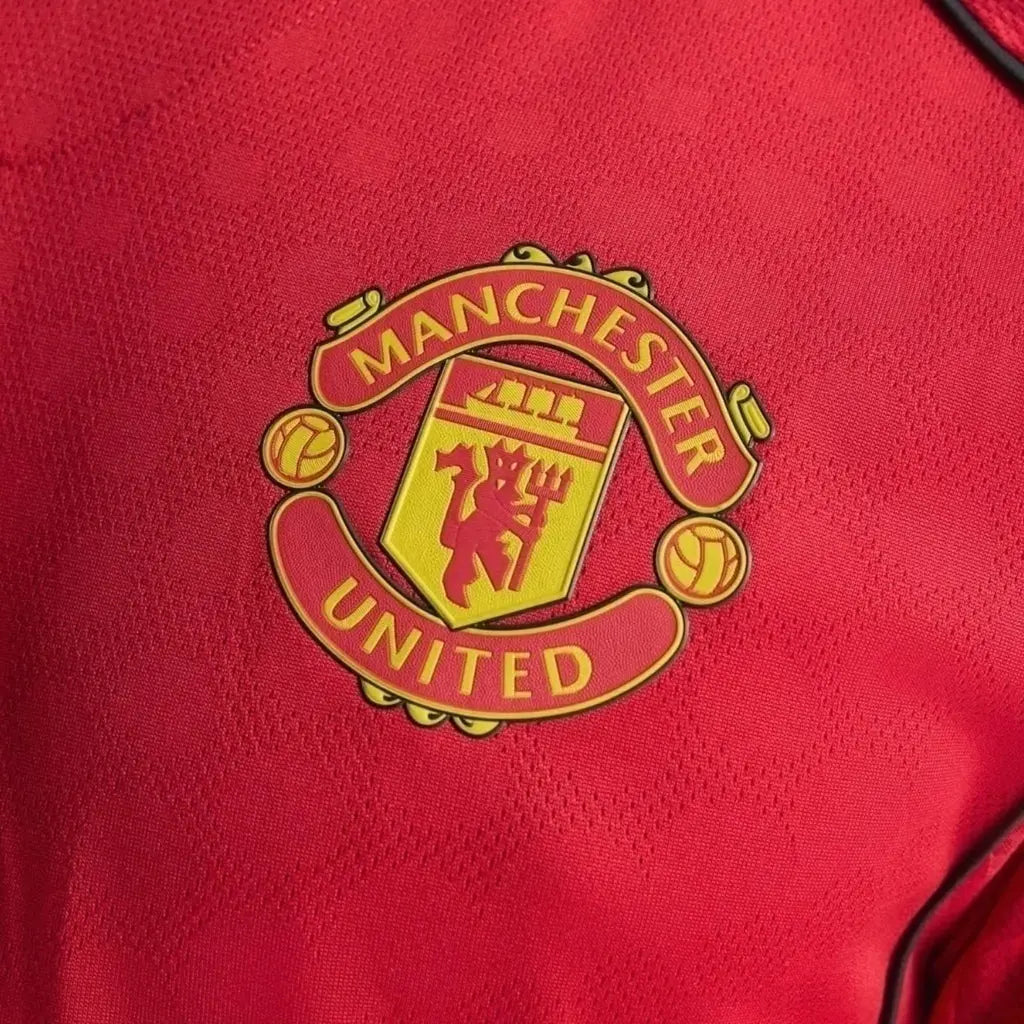 Camisa Manchester United I 25/26 - Feminina - Vermelha com detalhes em preto - Central das Camisas